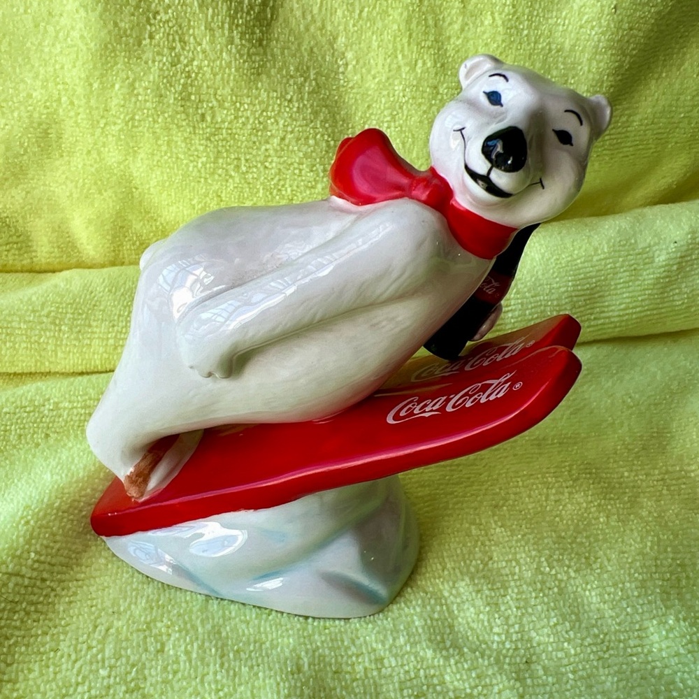 Coca-Cola Ceramic Polar Bear on Red Ski’s